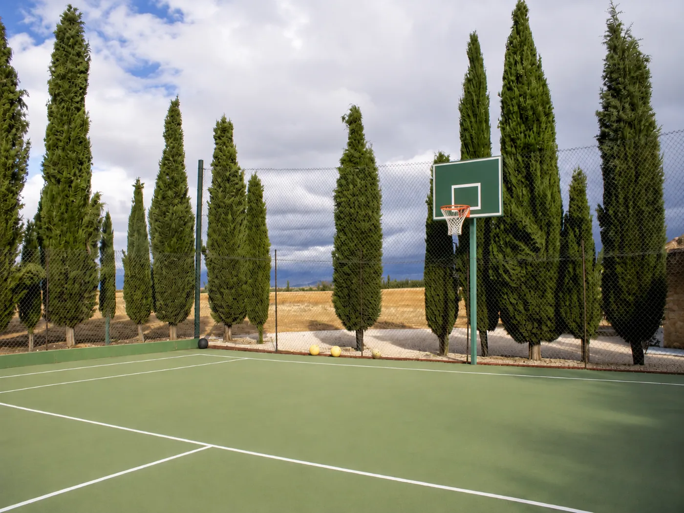 The tennis and basketball court in the grounds at Sierra Recovery