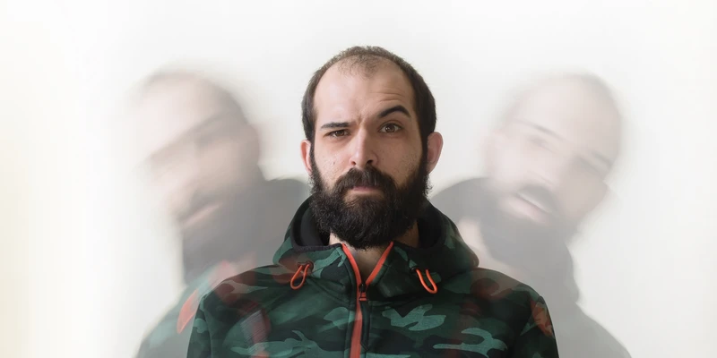 sierra recovery drug detox man beard green jacket