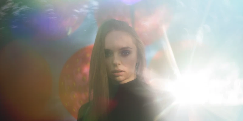 sierra recovery drug detox woman black dress standing front bright