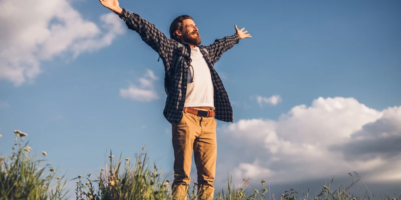 sierra recovery environment man standing field arms outstretched enviroment