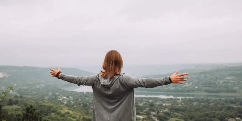 sierra recovery environment woman arms outstretched enviroment