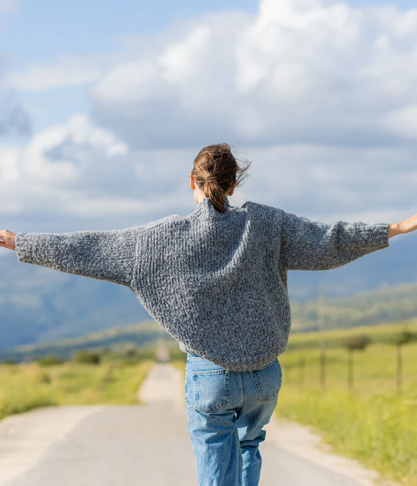 sierra recovery environment woman walking road arms outstretched enviroment