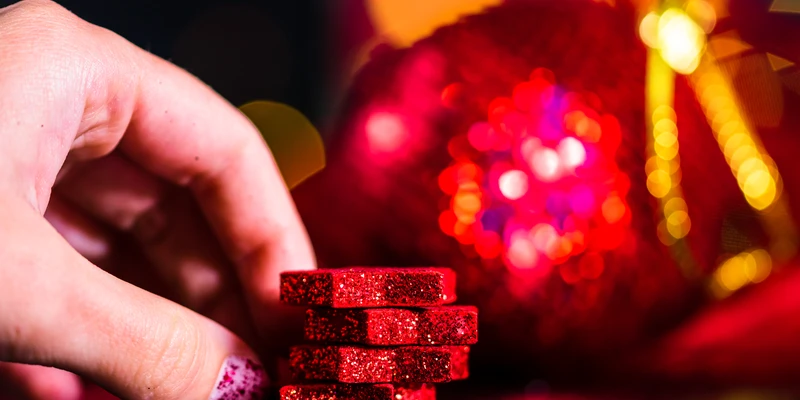 sierra recovery gambling addiction person holding stack red dice