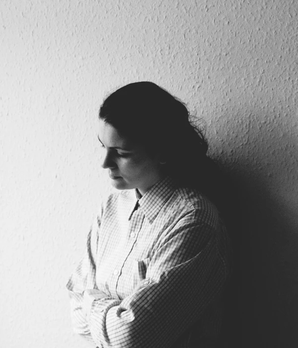 sierra recovery mental health woman leaning wall