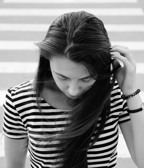 sierra recovery mental health woman long hair striped shirt