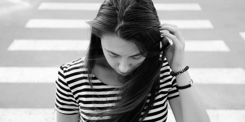 sierra recovery mental health woman sitting ground head hands