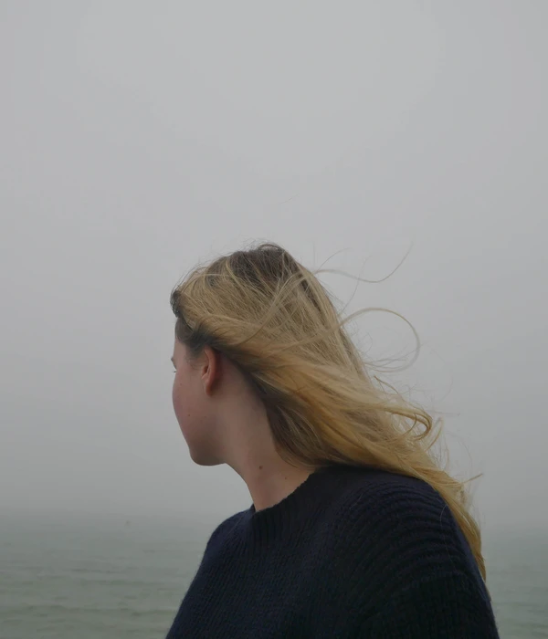 sierra recovery mental health woman standing beach looking out ocean