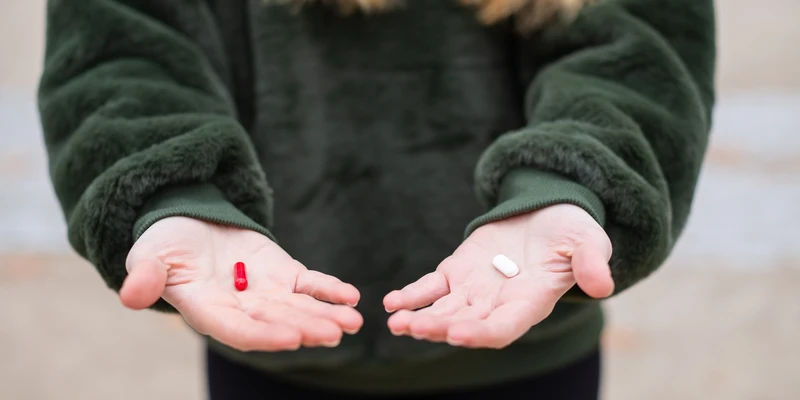 sierra recovery opioid woman holding pill hands