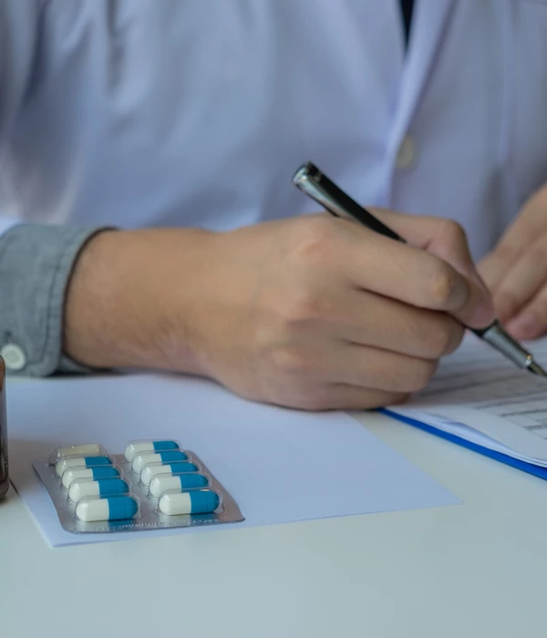 sierra recovery prescription drug man sitting desk writing piece paper