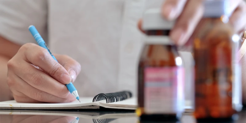 sierra recovery prescription drug person writing notebook pen