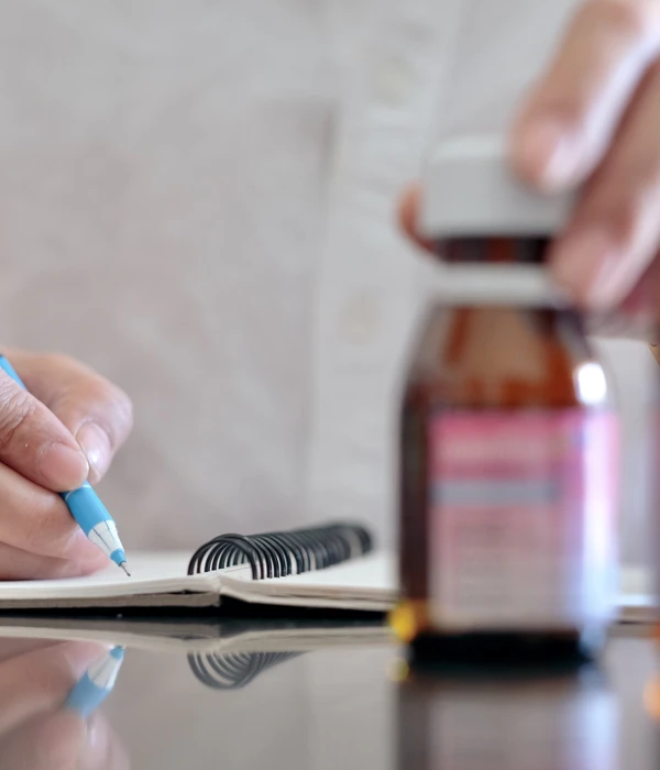 sierra recovery prescription drug person writing notebook pen