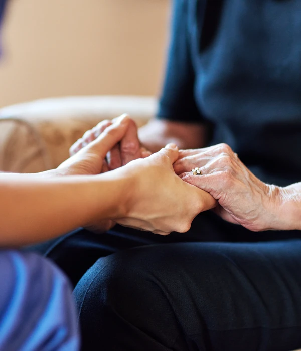 sierra recovery therapy woman holding hand elderly