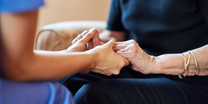 sierra recovery therapy woman holding hand older