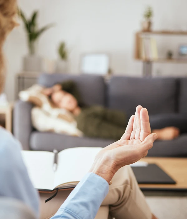 sierra recovery therapy woman sitting floor front man who lying