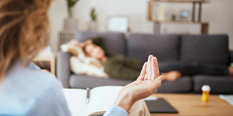 sierra recovery therapy woman sitting table hands