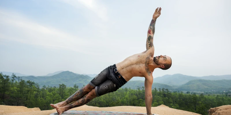 sierra recovery yoga man doing rock